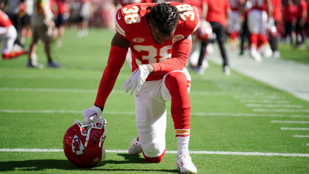 Sep 24, 2023; Kansas City, Missouri, USA; Kansas City Chiefs cornerback L'Jarius Sneed (38) kneels on field against the Chicago Bears prior to a game at GEHA Field at Arrowhead Stadium. Mandatory Credit: Denny Medley-USA TODAY Sports  